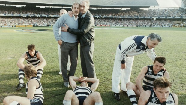 Fred Wooller consoles Geelong coach Malcolm Blight after their 1989 grand final loss.  Players, from left: Flanigan, Stoneham, Bews, Bairstow and Couch.  