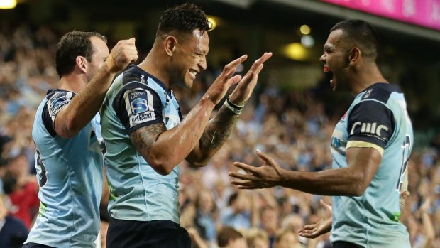 Happier times: Israel Folau and Kurtley Beale play for the Waratahs in 2016