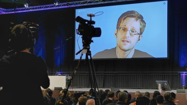American whistleblower Edward Snowden delivers a talk via video.