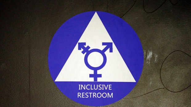 A sticker designates a gender neutral bathroom at Nathan Hale high school in Seattle. 