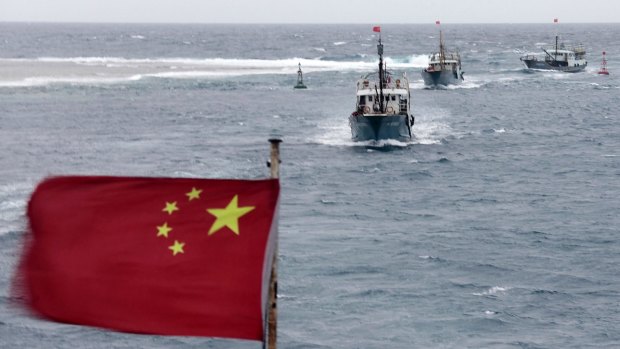 Chinese fishing boats sail near Meiji reef off the island province of Hainan in 2012 in a part of the South China Sea that is also claimed by Vietnam. China has territorial disputes in the South China Sea with several nations.