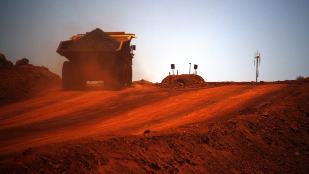 A Fortescue Metals Group autonomous haul truck loaded with iron ore in the Pilbara.