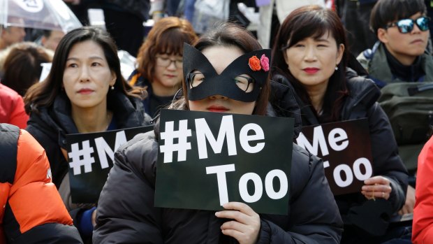 Female workers supporting the MeToo movement.