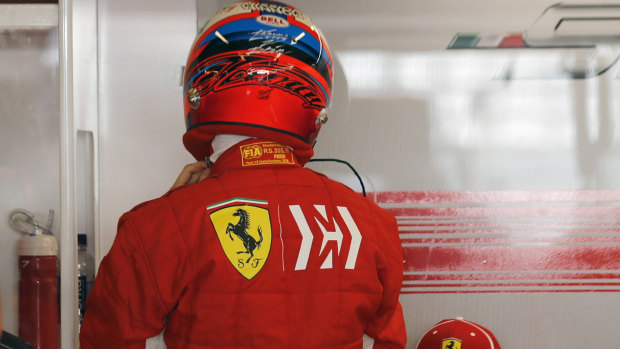 Ferrari driver Kimi Raikkonen sports the Mission Winnow logo on his racing uniform.