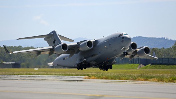 A C-17 Globemaster leaves RAAF base for Vanuatu after Cyclone Pam in 2017.