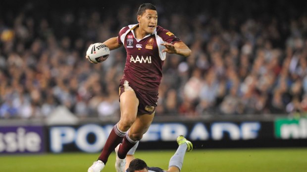 Israel Folau makes a break for Queensland in the 2009 State of Origin.