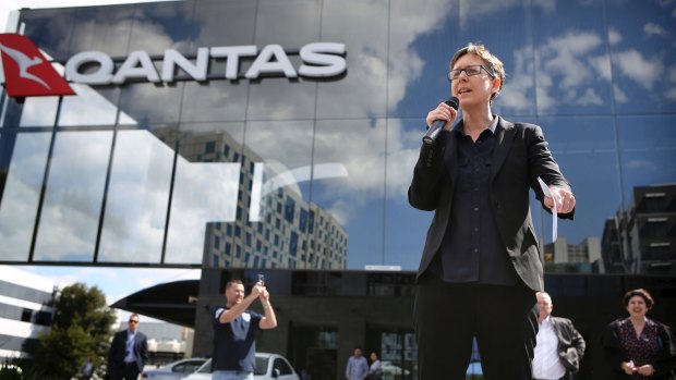 Sally McManus addresses Qantas employees at the airline's headquarters in Mascot in September, after workers' wage claims were frozen even as management took bonuses.
