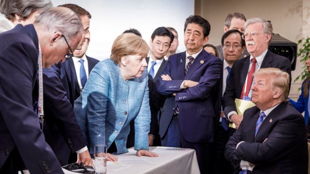 A photograph released by German Chancellor Angela Merkel's office captured the tense relations at the G7 summit.