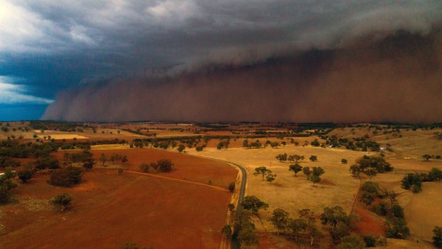 Dust storm near Orange, NSW in January. The relatively stable climate that has supported human civilisation for the past six millennia is likely to shift in the next 50 years because of climate change.