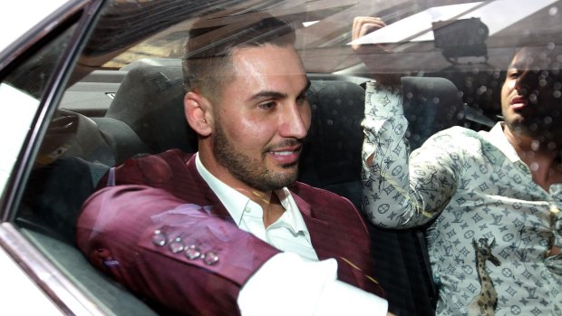 Salim Mehajer leaves Darling Harbour police station after assaulting a taxi driver in April 2017.