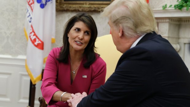 US President Donald Trump meeting with then- outgoing US Ambassador to the United Nations Nikki Haley last year.