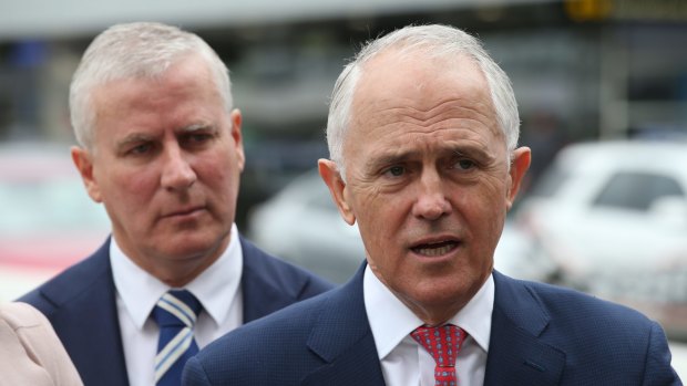 Then-PM Malcolm Turnbull pledging $5 billion in April 2018 for a rail link to Melbourne airport, as Deputy PM Michael McCormack looks on.