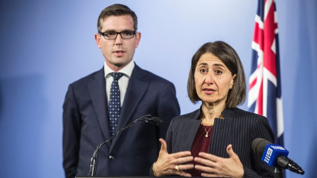 Premier Gladys Berejiklian and Treasurer Dominic Perrottet the day they announced the land titles registry concession.