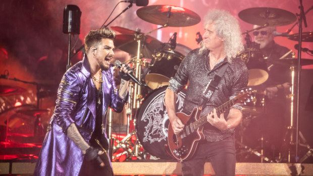 Adam Lambert and Brian May, with Roger Taylor on drums.