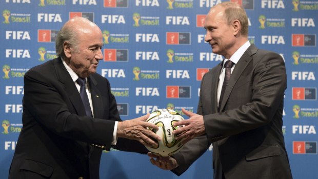'Old friends': Disgraced former FIFA president Sepp Blatter and Russian President Vladimir Putin.