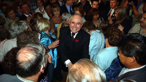 John Howard celebrates his 2001 election victory. 