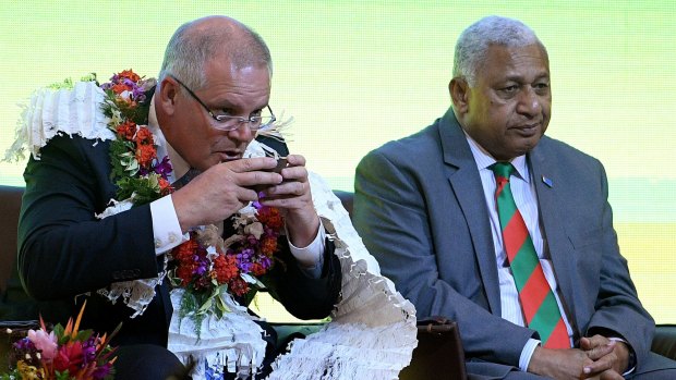 Australian Prime Minister Scott Morrison at a welcome ceremony with Fijian Prime Minister Frank Bainimarama in Suva last Thursday.