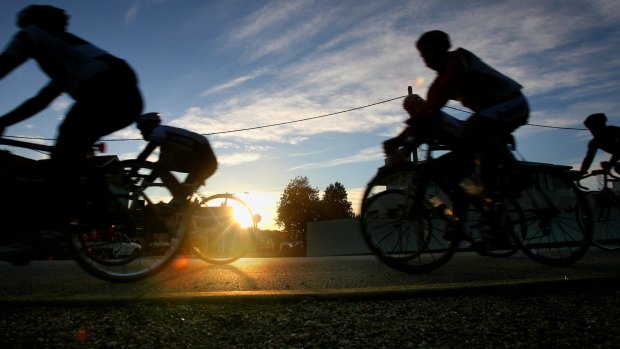 Dawn patrol: cyclists on Melbourne's Beach Road. 
