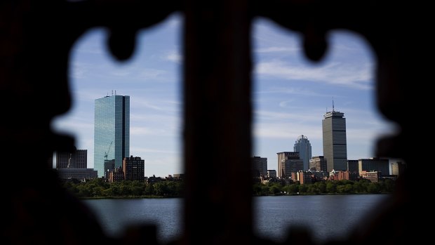 Buildings stand in the skyline of Boston, Massachusetts, U.S., on Tuesday, Aug. 7, 2012. Boston, a leading city for finance, has an economic base that includes research, manufacturing, and biotechnology. Photographer: Brent Lewin/Bloomberg
