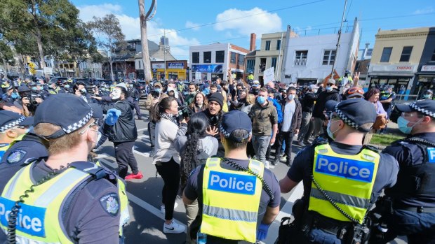 Dozens of police descended Queen Victoria market after anti-lockdown protesters marched through the iconic site as part of a 'Freedom Day' protest. 
