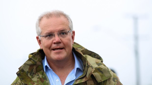 Prime Minister Scott Morrison, pictured in Townsville on Tuesday, ruled out a snap election over the refugee vote.