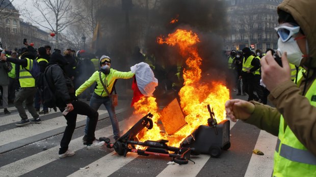 Demonstrators set a fire on the Place de la Republique after a yellow vest protest in February. 