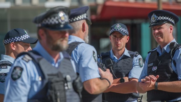 ACT police officers outside the Legislative Assembly in December last year.