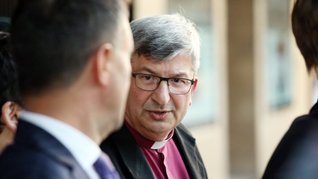 Bishop Roger Herft leaving Newcastle Court House after a session of the Royal Commission into Institutional Responses to Child Sexual Abuse in the Newcastle Anglican Diocese in 2016. 