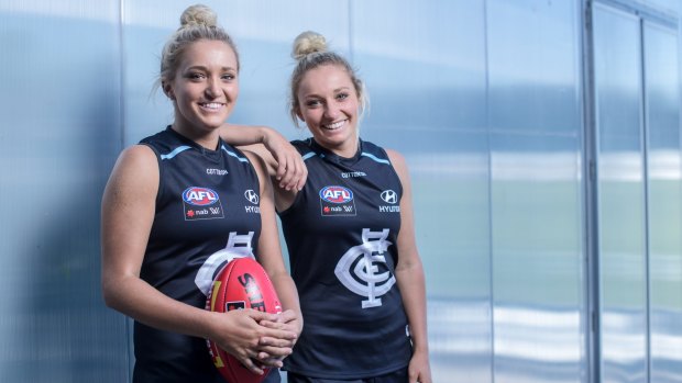 Jess and Sarah Hosking, pictured together in Carlton colours in 2018, have reunited at Richmond.