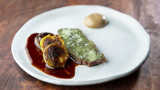 Binnie beef flank, Brussels sprouts, salt bush, onion jus and black garlic.