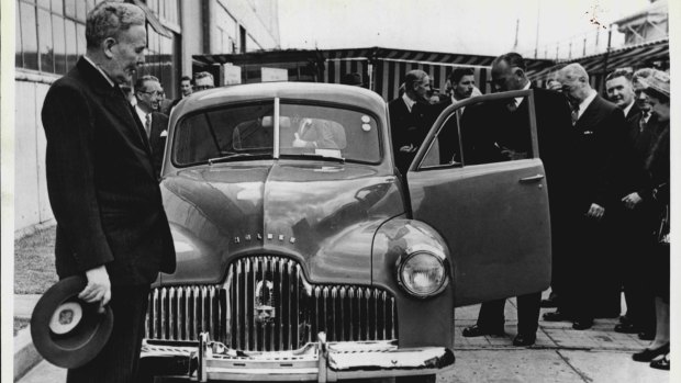 Ben Chifley with the first Holden in 1948. 