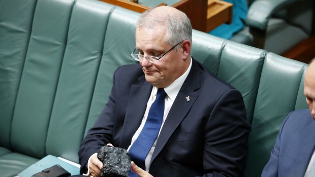 Then treasurer Scott Morrison brings a lump of coal into Parliament in 2017.