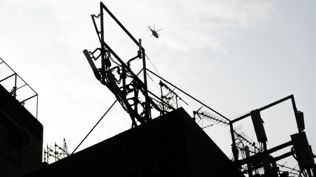 A police helicopter monitors a rally in Sham Shui Po district.