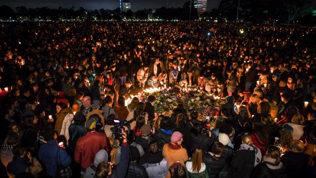 Thousand of people attend a candlelight vigil in solidarity for the Melbourne comedian Eurydice Dixon who was found dead at Princes Park in North Carlton last week. 18 July 2018. The Age News. Photo: Eddie Jim.