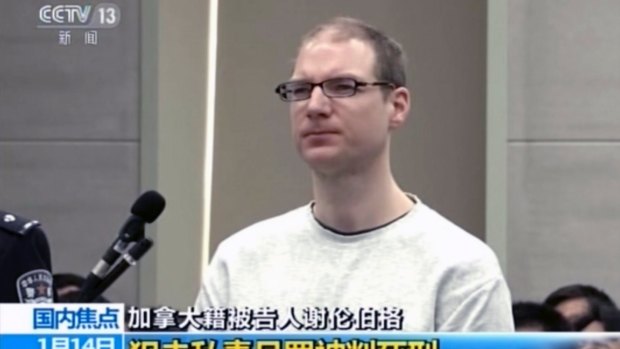 Canadian Robert Lloyd Schellenberg attends his retrial at the Dalian Intermediate People''s Court.