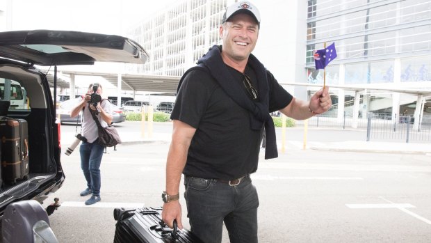Former Today host Karl Stefanovic leaves Sydney Airport with his new bride Jasmine Yarbrough after returning from their lavish wedding in Mexico in December.