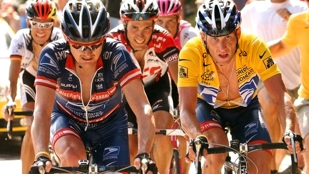 Lance Armstrong (right)  follows teammate Floyd Landis during the 2004 Tour de France.