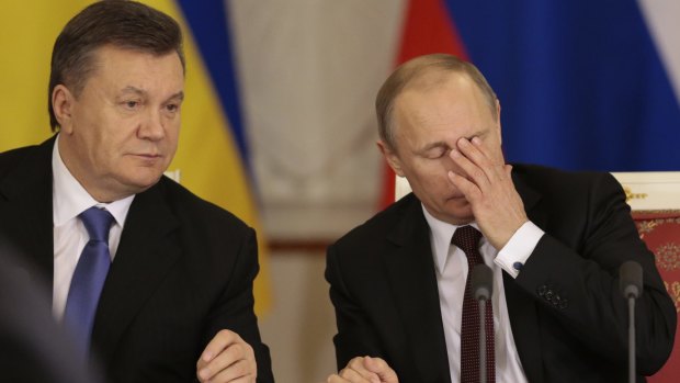 Russian President Vladimir Putin, right, with his Ukrainian counterpart Viktor Yanukovych in Moscow in 2013.