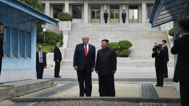 US President Donald Trump and North Korean leader Kim Jong-un stand on the North Korean side in the Demilitarizsed Zone at Panmunjom on Sunday.