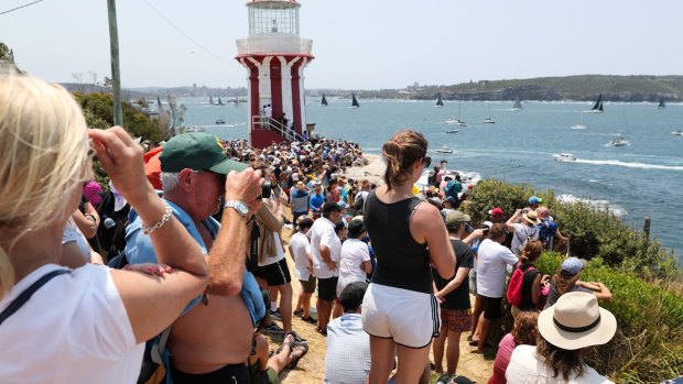 Crowds at South Head watch the start of the Sydney to Hobart.