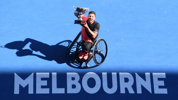 Dylan Alcott triumphs at the Australian Open in January.