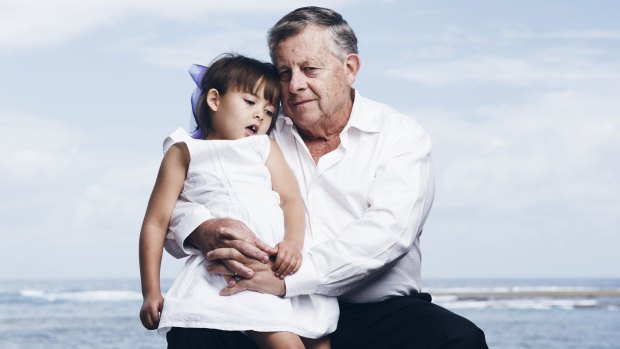 Barry Lambert, pictured with his granddaughter, donated $33 million to cannabis research. 