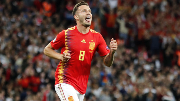 Vanquished: Spain's Saul Niguez celebrates after scoring his side's first goal against England.