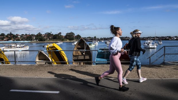 Runners at a popular stretch along Sydney Harbour at Lilyfield. 