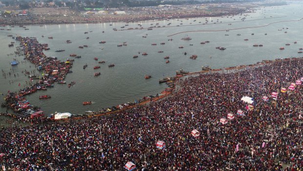 Thousands of Hindu pilgrims take a ritualistic dip on the auspicious day of Basant Panchami at Sangam on Sunday.