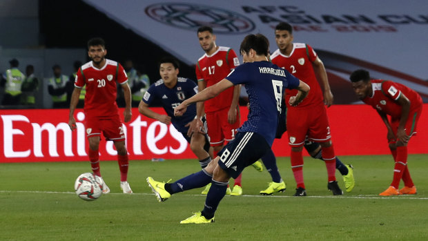 Difference-maker: Genki Haraguchi's spot kick was enough for Japan to guarantee their progress.