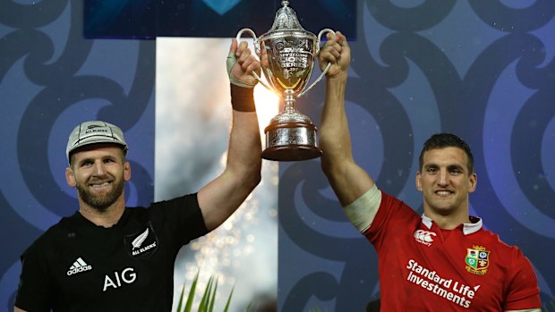 Extraordinary: New Zealand captain Kieran Read, left. and Lions captain Sam Warburton share the spoils after an epic three-Test series.