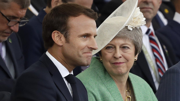 French President Emmanuel Macron and British Prime Minister Theresa May.