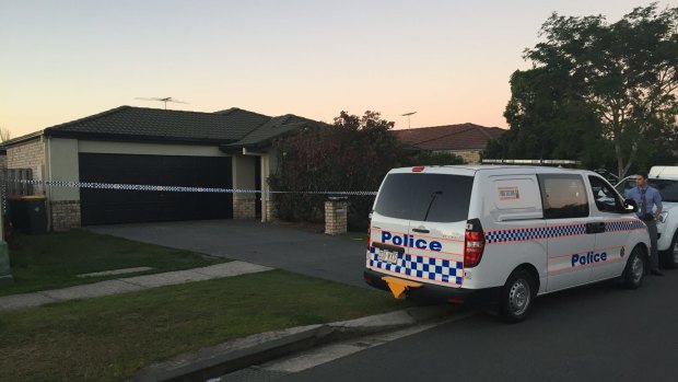 Police at the scene at Aldea Circuit, Bracken Ridge where a woman was found with burns.