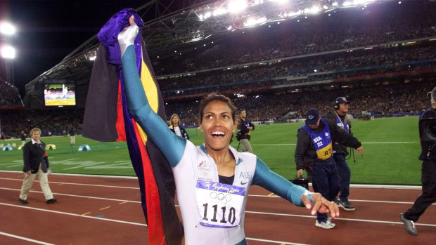 Australia's Cathy Freeman celebrates winning the women's 400-metre race at the Sydney Olympics in 2000.